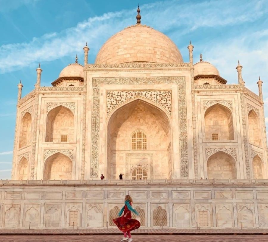  The sunset shines on the pure white walls of the Taj Mahal